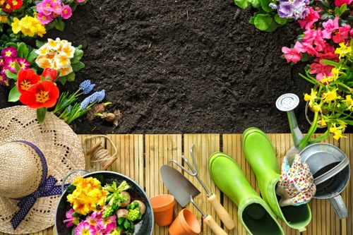 Professional landscaper working on a garden design in Brixton